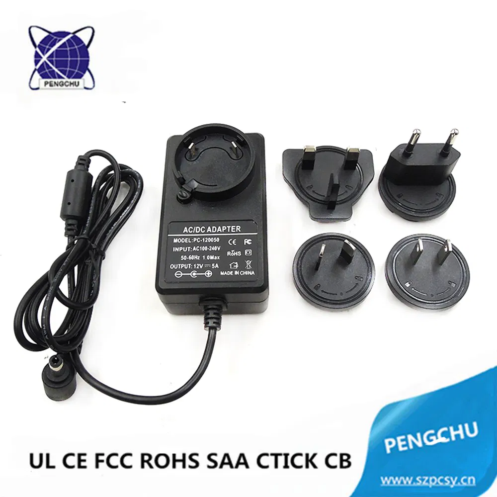 La UE permutable de la UE los E.E.U.U. del AU del adaptador 60W AC DC de salida única de 12V 5A Wallmount cubre